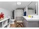 Contemporary bathroom with double vanity, and tub/shower combo at 1127 W Webb Ave, Burlington, NC 27217