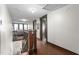 Bright hallway with wood flooring, stairs and natural light at 1127 W Webb Ave, Burlington, NC 27217