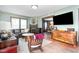 Comfortable living room with hardwood floors, decorative accents, and an open floor plan at 1127 W Webb Ave, Burlington, NC 27217