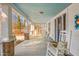 Inviting porch with rocking chairs, textured rug, and a view of the outdoor surroundings at 1127 W Webb Ave, Burlington, NC 27217