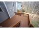 Spacious back deck with wooden railings, perfect for outdoor entertaining and relaxation at 113 Hawkscrest Ct, Apex, NC 27502