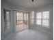 Bright breakfast nook with large windows and sliding glass door to the deck at 113 Hawkscrest Ct, Apex, NC 27502