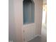 Hallway with access to a storage space, adding charm and functionality to the home at 113 Hawkscrest Ct, Apex, NC 27502