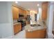 Spacious kitchen featuring stainless steel appliances, granite counters, and ample cabinet space at 113 Hawkscrest Ct, Apex, NC 27502