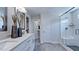 Elegant bathroom featuring double sinks, a glass-enclosed shower, and modern finishes at 1133 Sun Springs Rd, Wake Forest, NC 27587