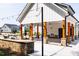 Exterior view of outdoor pavilion with built-in grill and seating at 1133 Sun Springs Rd, Wake Forest, NC 27587