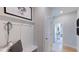 Inviting foyer with storage bench and a view into the adjacent room at 1133 Sun Springs Rd, Wake Forest, NC 27587