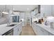 Bright kitchen with stainless steel appliances, a large island, and pendant lighting at 1133 Sun Springs Rd, Wake Forest, NC 27587