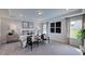 Spacious primary bedroom with tray ceiling, large windows, and neutral tones at 1133 Sun Springs Rd, Wake Forest, NC 27587