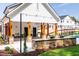 Exterior shot of community area featuring pavilion, barbeque area, and tennis court at 1133 Sun Springs Rd, Wake Forest, NC 27587