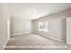 Spacious bedroom with carpet, natural light, and ample closet space at 1794 Parham Dr, Graham, NC 27253