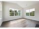 Bright room filled with light coming through large windows at 1794 Parham Dr, Graham, NC 27253