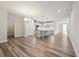 Bright, open-concept living area flowing into the kitchen and dining space at 1794 Parham Dr, Graham, NC 27253