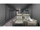 Home theater seating area with tiered platform and plush seating, accented with sconce lighting at 204 Woodstaff Ave, Wake Forest, NC 27587