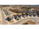 Aerial view of home showing driveway, landscaping, and neighboring properties at 2109 Flycatcher Ln, Fuquay Varina, NC 27526
