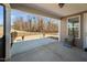 Inviting covered back porch with views of a fenced yard, perfect for enjoying outdoor living at 2109 Flycatcher Ln, Fuquay Varina, NC 27526