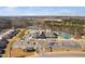 Expansive community clubhouse featuring a pool, tennis courts, and ample parking for residents and guests at 2109 Flycatcher Ln, Fuquay Varina, NC 27526