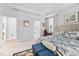 Comfortable main bedroom featuring a tray ceiling, ensuite bath access, and soft, neutral decor at 2109 Flycatcher Ln, Fuquay Varina, NC 27526