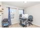 Bedroom office with dual windows and a computer workstation at 234 Palmetto Tree Way, Knightdale, NC 27545