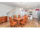 Dining area with a dining table and kitchen access at 234 Palmetto Tree Way, Knightdale, NC 27545