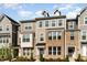 Lovely townhome exhibiting detailed siding and manicured landscaping at 234 Palmetto Tree Way, Knightdale, NC 27545