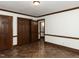 Bedroom with dark-colored tile flooring and wood trim at 241 Beachers Brook Ln, Cary, NC 27511