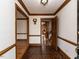 Inviting foyer featuring hexagon tile floor, wood trim, and open doorways at 241 Beachers Brook Ln, Cary, NC 27511