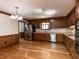 Spacious kitchen with wood cabinets, stainless steel appliances, and hardwood floors at 241 Beachers Brook Ln, Cary, NC 27511