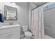 Updated bathroom featuring shower/tub combination and modern vanity at 290 Whistlers Cv, Louisburg, NC 27549