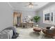 Cozy home office space with rustic accents and natural light from a window at 290 Whistlers Cv, Louisburg, NC 27549