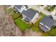 Overhead view of backyard featuring a cozy hot tub, and a screened-in porch for relaxation and outdoor enjoyment at 307 Sugarberry Ln, Clayton, NC 27527