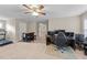 Spacious carpeted room with a bar area, desk and equipment at 307 Sugarberry Ln, Clayton, NC 27527