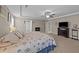 Spacious main bedroom boasts a fireplace and a sleek entertainment unit at 307 Sugarberry Ln, Clayton, NC 27527