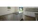 Eat-in kitchen area with island, recessed lighting, and sliding glass door to the backyard at 31 Red Cedar Way, Fuquay Varina, NC 27526
