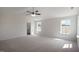 Spacious main bedroom with vaulted ceiling, carpet flooring, and plenty of natural light at 31 Red Cedar Way, Fuquay Varina, NC 27526