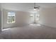 Large main bedroom featuring ample natural light from windows at 31 Red Cedar Way, Fuquay Varina, NC 27526
