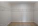 Walk-in closet with wire shelving for optimal storage at 31 Red Cedar Way, Fuquay Varina, NC 27526
