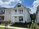 Charming two-story home showcasing a welcoming front porch and classic architectural details at 316 White Oak Garden Way # 217, Garner, NC 27529