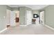 Bedroom featuring a connected bathroom and a built-in desk area, blending convenience at 3324 Thomas Rd, Raleigh, NC 27607