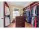 Large closet features ample storage with custom shelving and drawers to organize all of your belongings at 3324 Thomas Rd, Raleigh, NC 27607