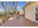 Expansive deck with outdoor dining set, ideal for entertaining and enjoying the view at 3324 Thomas Rd, Raleigh, NC 27607