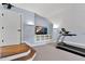 Well-equipped home exercise room with a modern treadmill and television, perfect for staying active at 3324 Thomas Rd, Raleigh, NC 27607