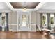 Elegant foyer with a decorative front door and hardwood floors at 3324 Thomas Rd, Raleigh, NC 27607