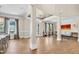 Open-concept layout of dining area and foyer, offering natural light and hardwood floors at 3324 Thomas Rd, Raleigh, NC 27607