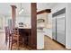 Gourmet kitchen featuring a large island, stainless steel appliances, and custom cabinets at 3324 Thomas Rd, Raleigh, NC 27607