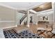 Spacious living room with stairs, dining room, and an open floor plan at 3324 Thomas Rd, Raleigh, NC 27607