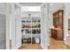 Large walk-in pantry with shelves stocked with food and supplies at 3324 Thomas Rd, Raleigh, NC 27607