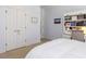 Bedroom with white walls, carpet, closet, and desk area, offering space and organization at 3359 Hampton Rd, Raleigh, NC 27607
