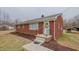 Charming brick home with front door wreath at 4166 Nc 119, Mebane, NC 27302