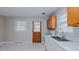 Clean kitchen with a laminate countertop, view of backyard, and neutral walls at 4166 Nc 119, Mebane, NC 27302